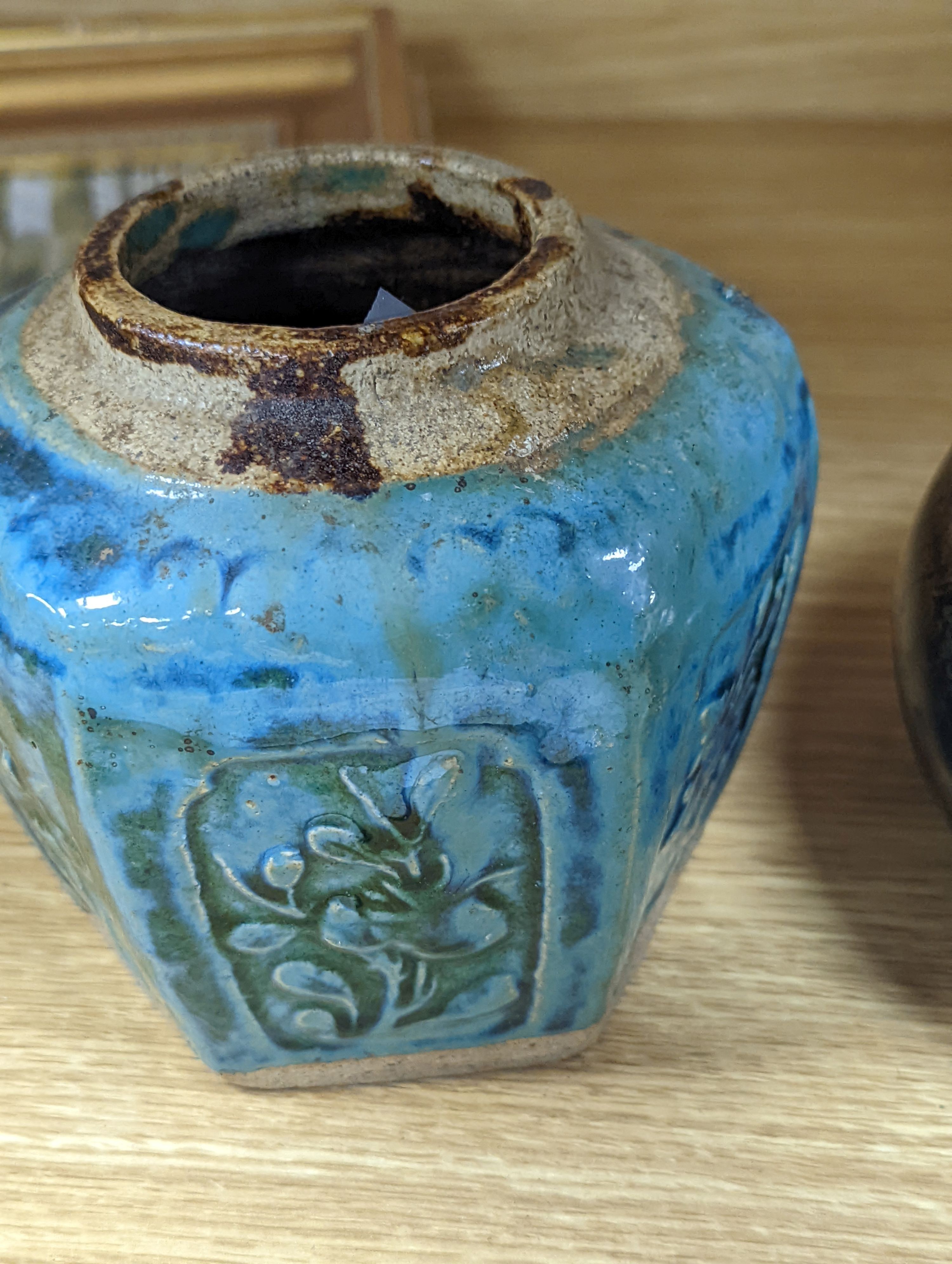 Two Chinese bronze handwarmers and a turquoise glazed jar